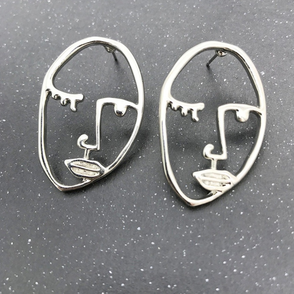 2/$20! Silver Abstract Visage Earrings - Picture 4 of 11